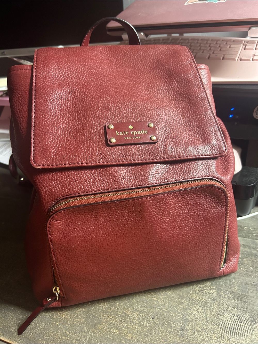 Kate Spade New York Cobble Hill Charley Backpack in a merlot/burgundy color